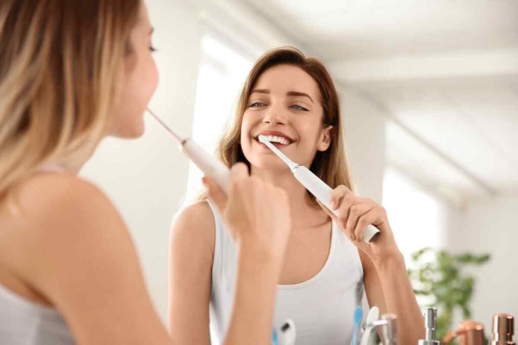 how to brush your teeth with an electric toothbrush castle hill